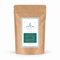 A kraft paper stand-up pouch of Palm & Pine Coffee Loose Leaf Tea on a clean white background.