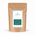 Brown kraft paper pouch of Palm & Pine Coffee Chamomile Ginger loose leaf tea with notes of honey, ginger, and lemon