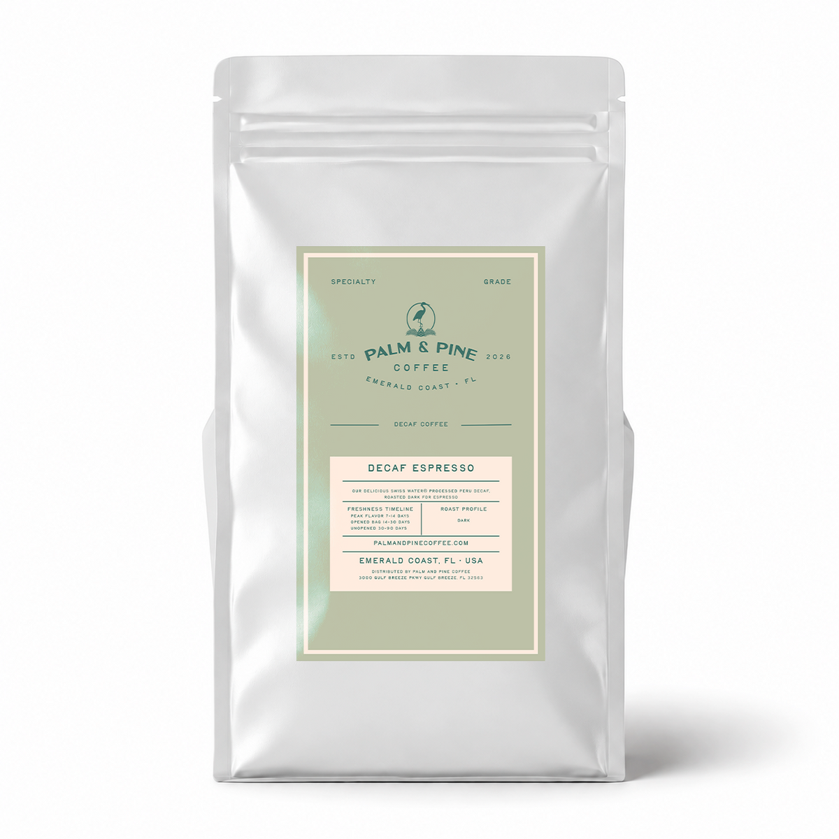 A silver stand-up coffee bag with a front label reading Palm & Pine Coffee Decaf Espresso, photographed on a clean white background with a soft shadow.