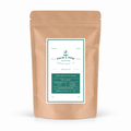A kraft paper stand-up pouch of Palm & Pine Coffee on a clean white background. The front label features a white and dark green design with the brand name 'Palm & Pine Coffee' and product details.