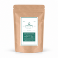 A kraft paper stand-up pouch of Palm & Pine Coffee on a clean white background. The front label features a white and dark green design with the brand name 'Palm & Pine Coffee' and product details.